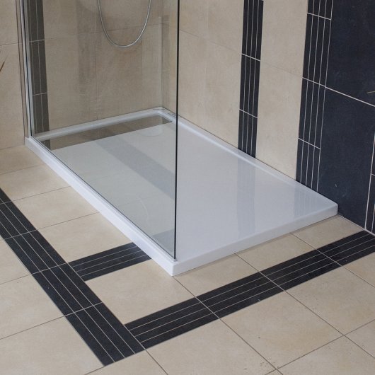 INTEGRO shower tray with integrated siphon cover